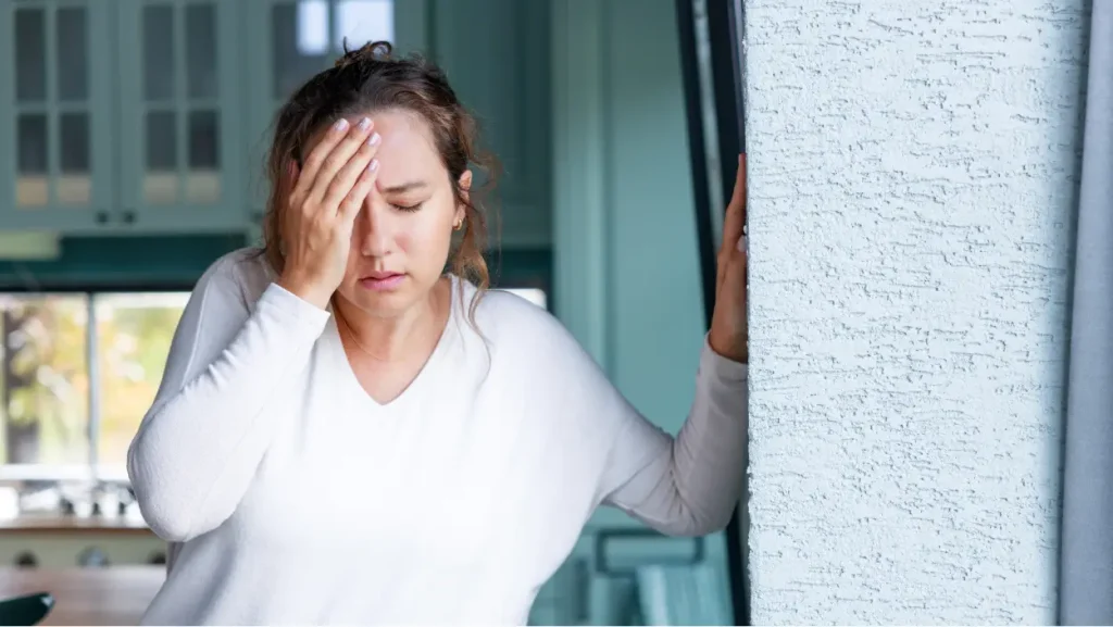 Možganska kap pri mladih – ženska z nenadno omotico in glavobolom